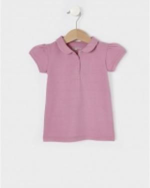 Polo de piqu&eacute; stretch b&aacute;sico de un solo color