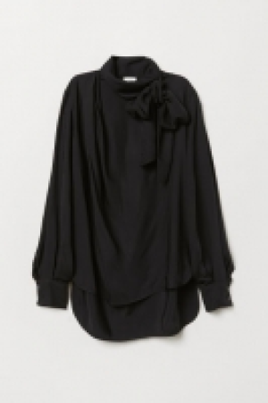  Blusa con lazada 41.99 €