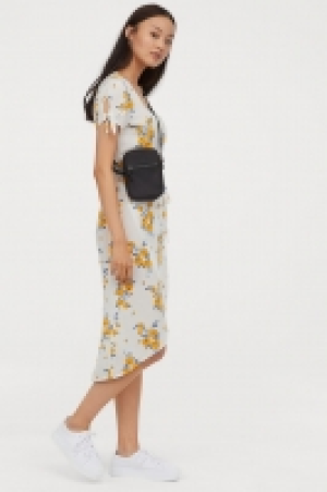  Vestido cruzado con estampado 16.99 €