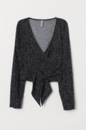  Blusa cruzada con escote en V 6.99 €