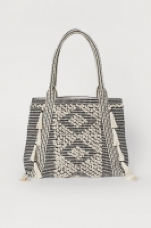  Bolso shopper con borlas 14.99 €