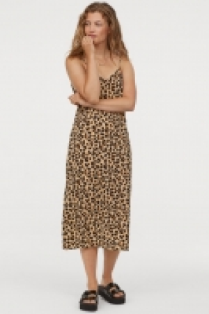  Vestido lencero escote en V 11.99 €