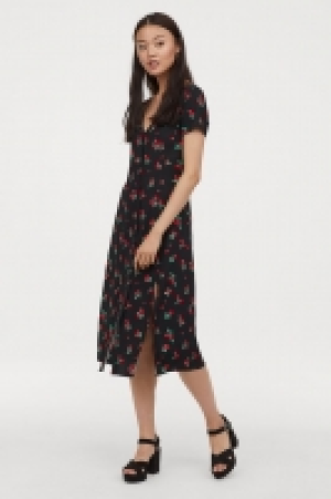  Vestido con escote de pico 16.99 €