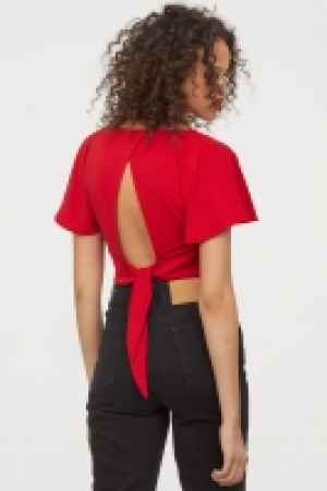 Top con escote de pico 6.99 €