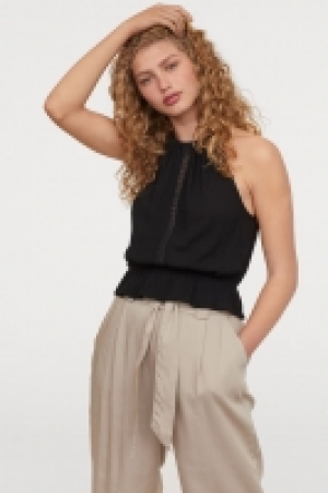  Top arrugado con encaje 4.99 €