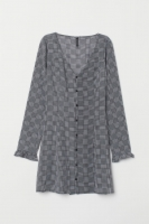  Vestido con escote de pico 6.99 €