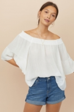  Blusa hombro descubierto 9.99 €