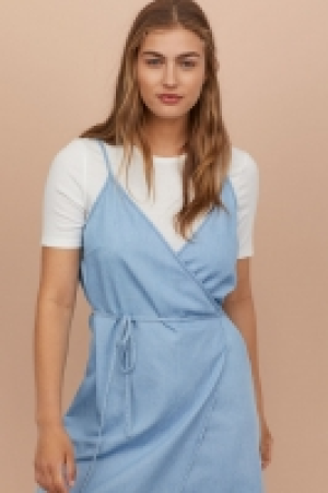  Vestido cruzado corto 10.99 €