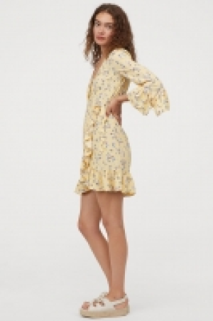  Vestido cruzado estampado 20.99 €