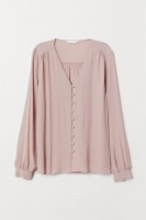  Blusa con escote de pico 7.99 €