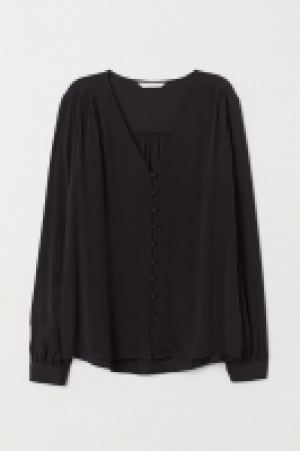  Blusa con escote de pico 4.99 €