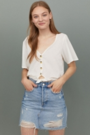  Top corto con lazada 6.99 €