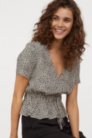  Blusa con escote en V 8.99 €