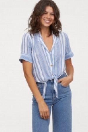  Blusa en mezcla de lino 9.99 €