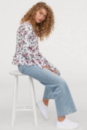  Blusa en V con botones 11.99 €