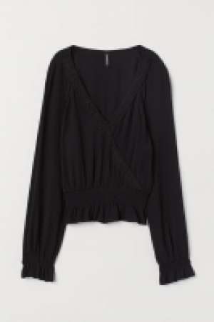  Blusa arrugada 11.99 €
