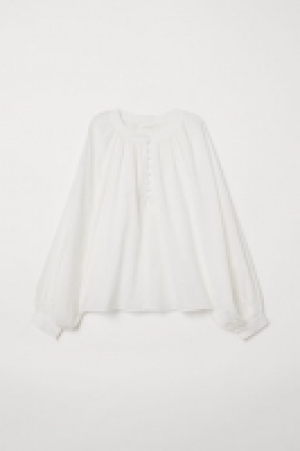  Blusa con mangas globo 7.99 €