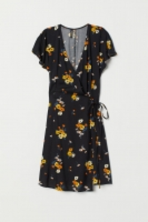  Vestido cruzado con estampado 8.99 €