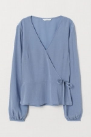  Blusa cruzada en jacquard 4.99 €