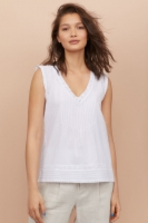  Top con encaje 12.99 €