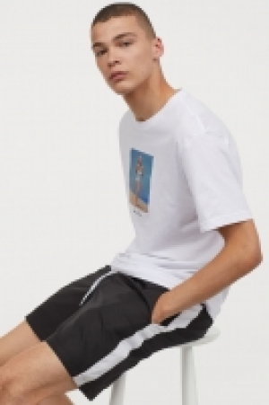  Pantalón corto con franjas 8.99 €