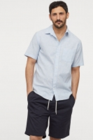  Camisa mezcla lino Regular Fit 11.99 €