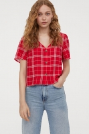  Blusa con escote de pico 3.99 €