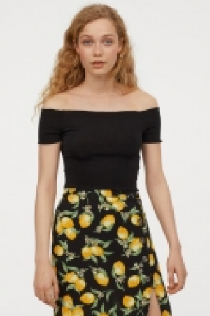  Top corto hombro descubierto 6.99 €