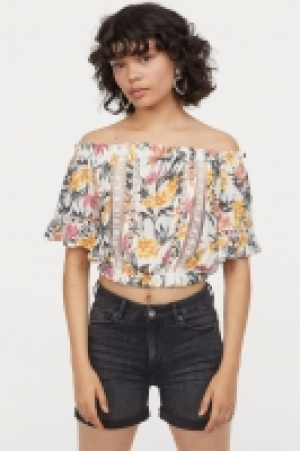  Blusa hombro descubierto 8.99 €