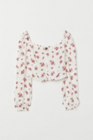 Blusa con mangas abullonadas 7.99 €