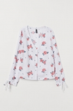  Blusa con botones 8.99 €