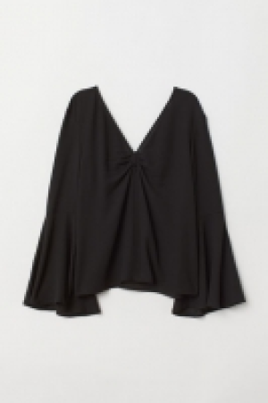  Blusa en tejido de crepé 11.99 €