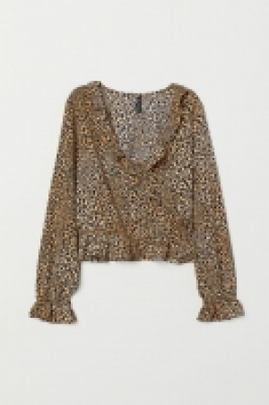  Blusa con volante 7.99 €