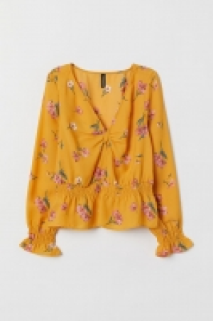  Blusa con nudo decorativo 8.99 €