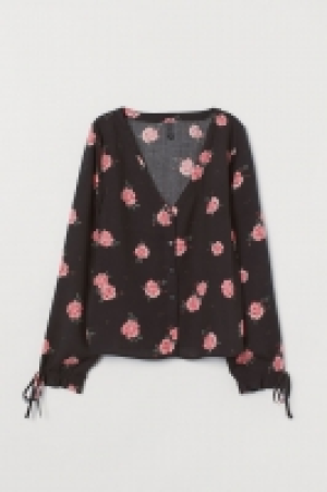  Blusa con botones 6.99 €