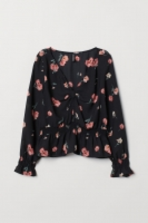  Blusa con nudo decorativo 7.99 €