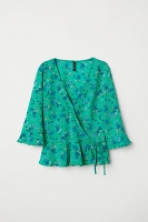  Blusa cruzada con escote en V 11.99 €
