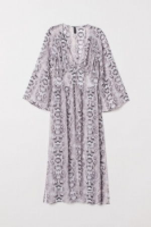  Blusa larga con botones 14.99 €