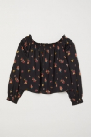  Blusa hombro descubierto 7.49 €