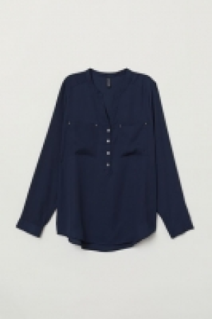  Blusa con escote de pico 13.99 €