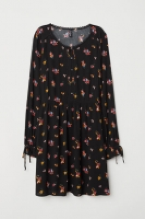  Vestido con botones 13.99 €