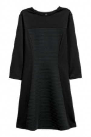  Vestido en punto de canalé 13.99 €