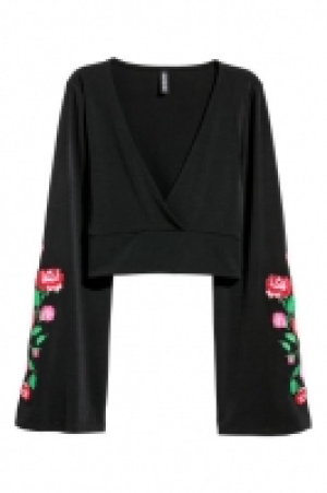  Top con bordados 11.99 €