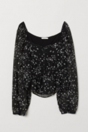  Blusa con botones 14.99 €