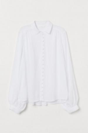  Blusa con botones 12.99 €