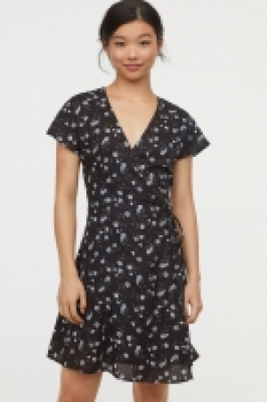  Vestido cruzado con estampado 5.99 €