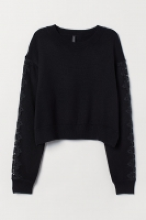  Jersey de punto con encaje 12.99 €