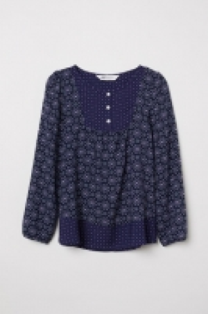  Blusa estampada de viscosa 4.99 €