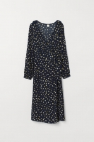  Vestido cruzado con estampado 14.99 €