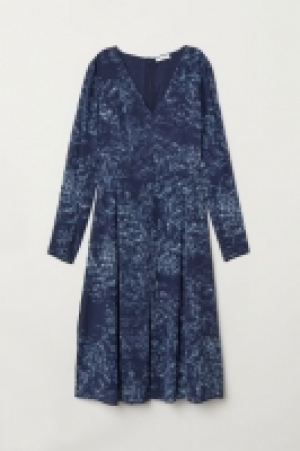  Vestido con escote de pico 27.99 €